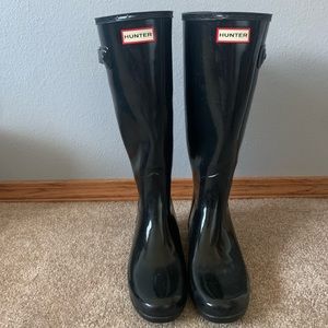 Black tall hunter boots